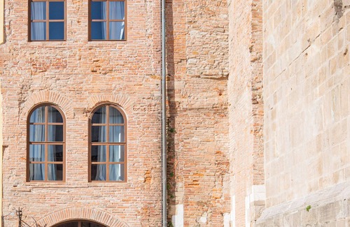Lucca Historical Center House | Medieval Tower House alongside the Cathedral San Martino Bell Tower built 1204.