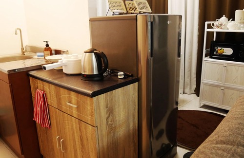 Balibago Condo | Megan Montagne Suite with AC and WiFi in marvelous City of Santa Rosa