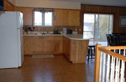 Newport Center House | Memphremagog lakefront home, large yard, waterfront, dock, and small beach