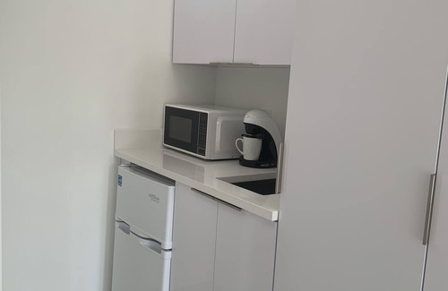 South Middle River House | Men Only Clothing Optional Guesthouse near Wilton Manors