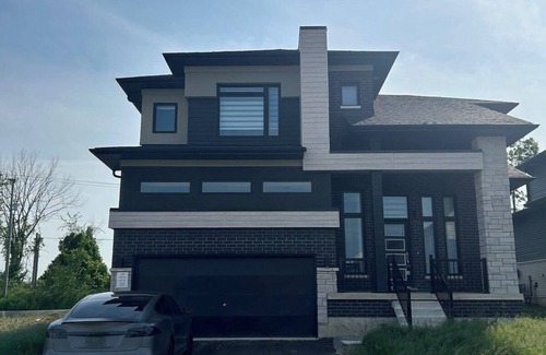 Cumberland Beach House | Menoke Modern Family Home with Game Room