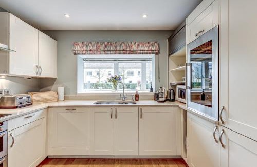 Cirencester House | Merlin House at Lower Mill Estate A gorgeous home with lake access, air conditioning and luxury spa access