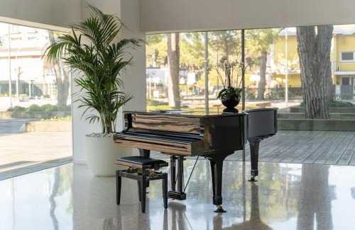 Jesolo Pineta Apartment | Merville 15 piano