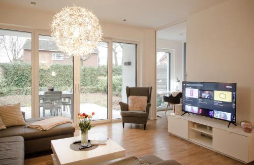 Oldenburg Apartment | MiCasa OL - Deluxe Apartment mit Stil - Carport Stellplatz - Küche - WLAN - 3,7 KW Steckdose für E Auto - Terrasse