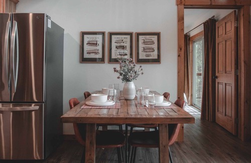 Riggins Cabin | Mid-century modern cowboy retreat with a 35-ft. deck on the Salmon River.