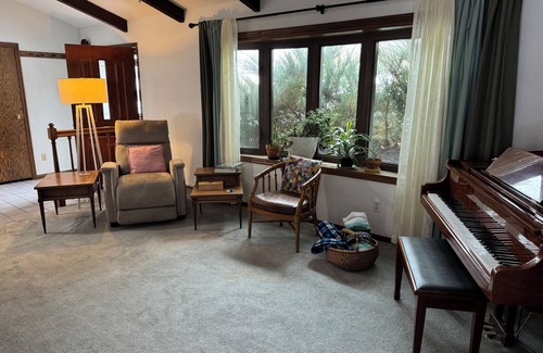 Brookings House | Mid-century Modern Home with Large Deck and Cozy Living Area