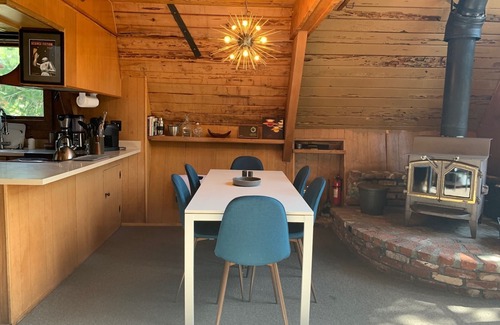 Serene Lakes House | Mid-Century Modern A-frame cabin by the lake