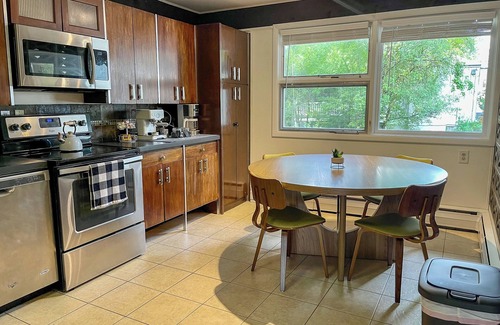 Eastside House | Mid-Century Prairie House by SU W/espresso/coffee bar, workspace & fast Wi-Fi