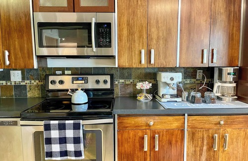 Eastside House | Mid-Century Prairie House by SU W/espresso/coffee bar, workspace & fast Wi-Fi