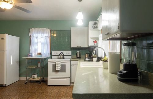 Bedford House | Mid Century Themed Limestone Cottage - 2 Bedrooms Sleeps 6 - Pets Welcome!