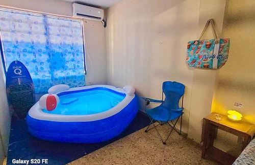 Gobernador Pinero Apartment | Mid-City Beach Apartment With Indoor LED Pool