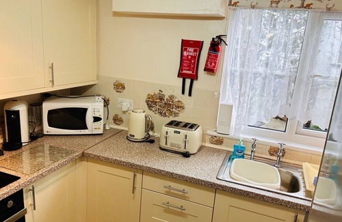 Woolfardisworthy Cottage | Millers cottage, a picturesque semi detached cottage with private garden