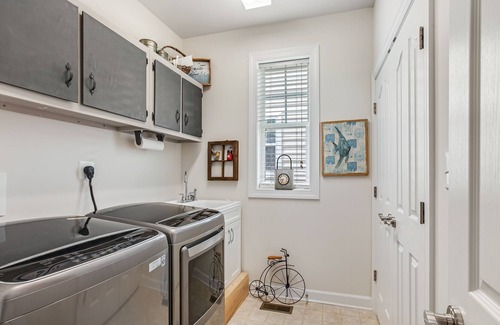 Millville House | Millville by the Sea | Lovely getaway w/pool, patio, lake view, central AC, gym