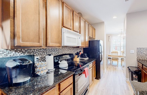 Millville House | Millville by the Sea three-story home with resort amenities & screened patio