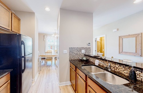 Millville House | Millville by the Sea three-story home with resort amenities & screened patio