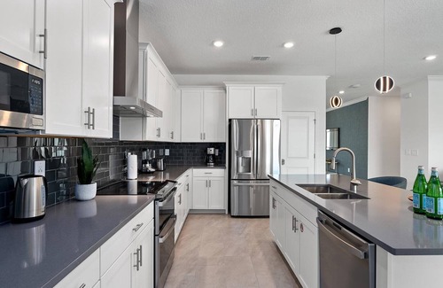 Melbourne Beach House | Mimosa Manor | Brand-New Beachfacing Villa w PVT Pool, Theater, Arcade, & More
