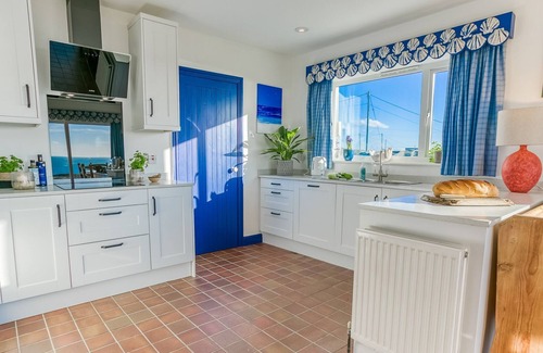 Trearddur Bay Cottage | Min y Mor - a sea view that sleeps 8 guests in 4 bedrooms