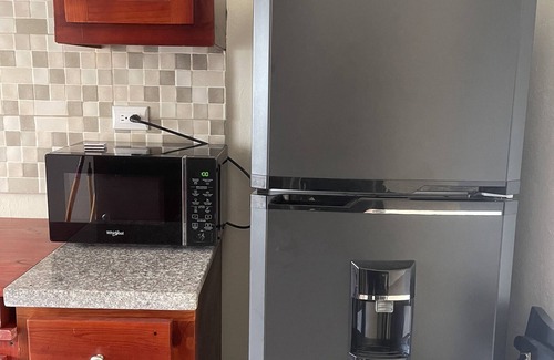 Santo Domingo Apartment | Minimalist 2-Bedroom 3FL loft Apt 20 mins from SDQ