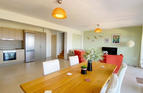 Kontos Condo | Minimalist, new condo with beautiful sea and mountain views