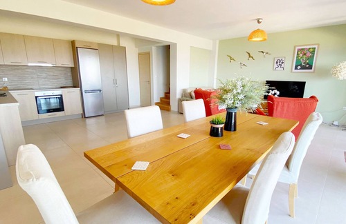 Kontos Condo | Minimalist, new condo with beautiful sea and mountain views