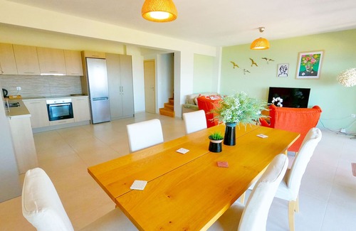 Kontos Condo | Minimalist, new condo with beautiful sea and mountain views