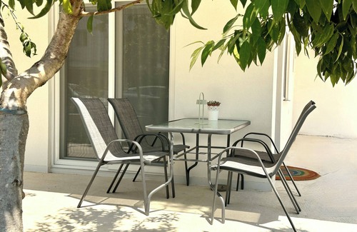 Olymbiaki Akti Apartment | Minimalist Seaside Apartment with Patio and Parking - Blue Zone Homes