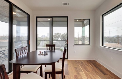 Swede Hill House | Minutes to Rainey St + Downtown, Downtown Views - Stylish Three Story Home - GuestSpaces