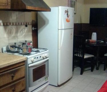 Dorrego Apartment | Mistela Altos de Mendoza- Departamentos y Habitaciones Sala con tragamonedas Zona Residencial a pasos de Ciudad- Tours de viajes- Merienda de Bienvenida - Viaje al Aeropuerto gratis -