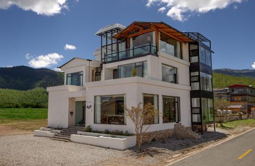 Shangri-La Hotel | Miyinxianye Snow Mountain Makino Migratory Bird Viewing B&B Napa Sea Scenic Area Branch