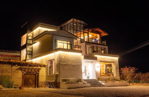 Shangri-La Hotel | Miyinxianye Snow Mountain Makino Migratory Bird Viewing B&B Napa Sea Scenic Area Branch