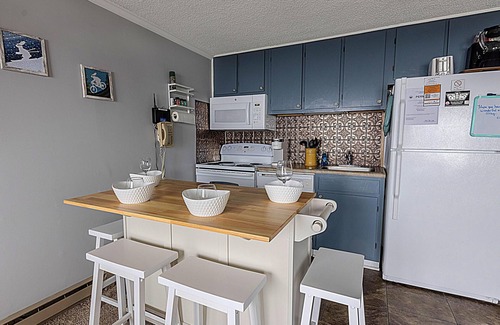 Snowshoe Condo | ML 166: Wonderful mountain views await you in this inviting summer oasis!