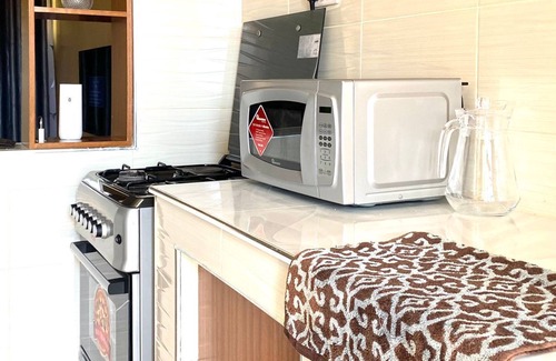 Ruiru Apartment | Modern 1-bedroom apartment in welcoming Ruiru with WiFi, Working table