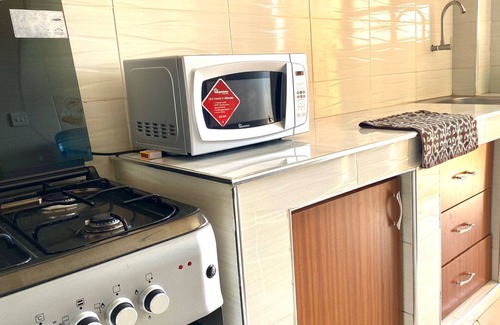 Ruiru Apartment | Modern 1-bedroom apartment in welcoming Ruiru with WiFi, Working table