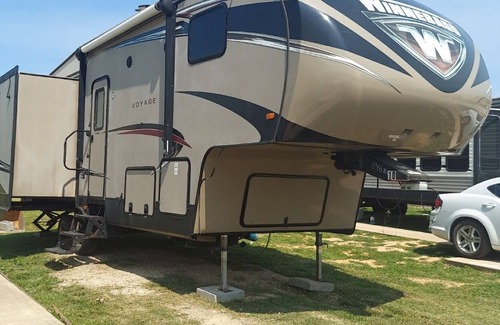 Brazoria House | Modern 1 bedroom RV w/ futon and a fireplace - Right by the river!