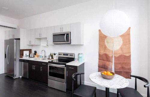 Milwaukee Apartment | Modern 1BR Apt with Skywalk to Fiserv, Rooftop, and Parking