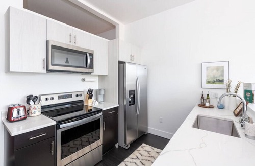 Milwaukee Apartment | Modern 1BR Apt with Skywalk to Fiserv, Rooftop, and Parking