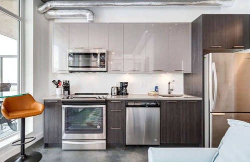 East Village Condo | Modern 1BR Condo for 4 | Great Views + Balcony!