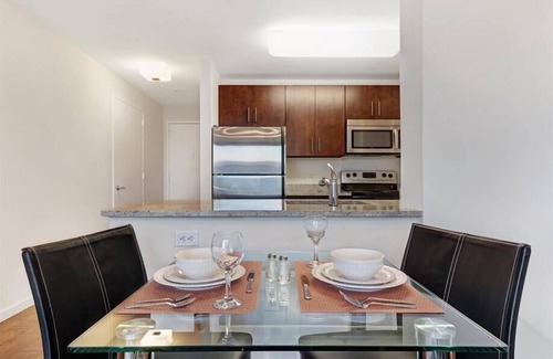 Hudson Exchange Apartment | Modern 1BR | Full Kitchen | W/D | NYC Views | by GLS