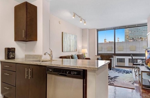 Hudson Exchange Apartment | Modern 1BR | Full Kitchen | W/D | NYC Views | by GLS