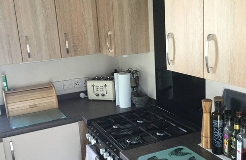 Dawlish Warren House | Modern 2 bed caravan with surrounding decking and patio; sleeps up to 6 people