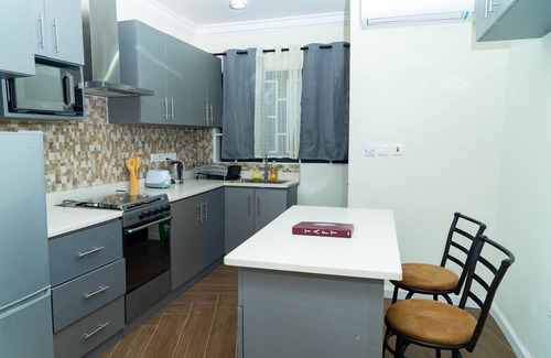 Amrahia Apartment | Modern 2-Bedroom Apartment Home on a Gated Compound with Backup Solar Power.