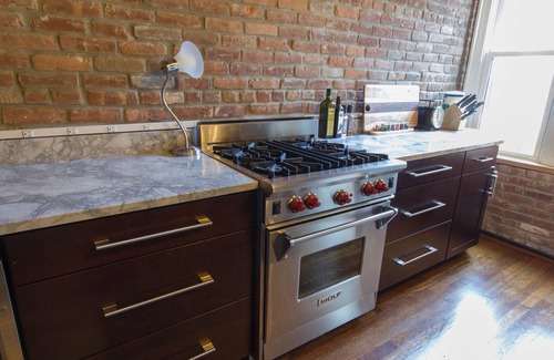 Cleveland Circle Condo | Modern 2-bedroom loft condo near BC, BU, hospitals & train w/parking available.