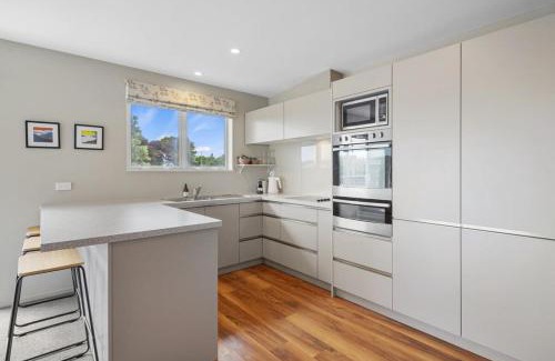 Christchurch House | Modern 2-Bedroom Oasis Just Steps from the Beach