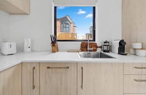 Henderson House | Modern 2-Bedroom Retreat with Private Patio