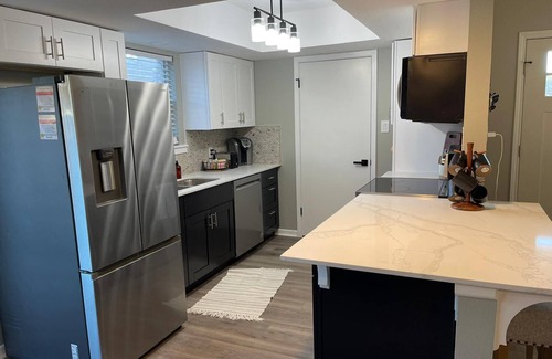 Taylor House | Modern 2-bedroom townhome with fenced yard in welcoming Taylor