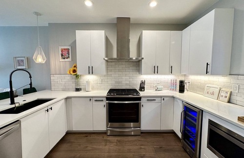 West Colfax House | Modern 2-Bedroom - Walk to Broncos w/Hot Tub, Patio, & Fireplace!
