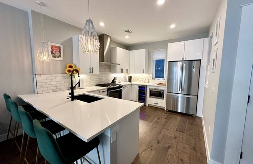 West Colfax House | Modern 2-Bedroom - Walk to Broncos w/Hot Tub, Patio, & Fireplace!