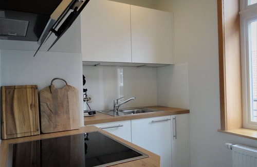 Bad Essen House | Modern 2-storey apartment in a listed half-timbered house on the market