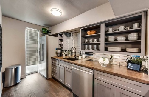 Old East Dallas Condo | Modern 2BR, 2BA luxury condo in central Dallas with private patio, designer interiors, and access to award-winning courtyard retreat.