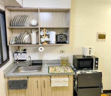Imus Apartment | Modern 2BR Condo with Terrace,Netflix,Pool,& WiFi